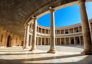 Arcade with columns of Alhambra palace Charles V in Granada. And