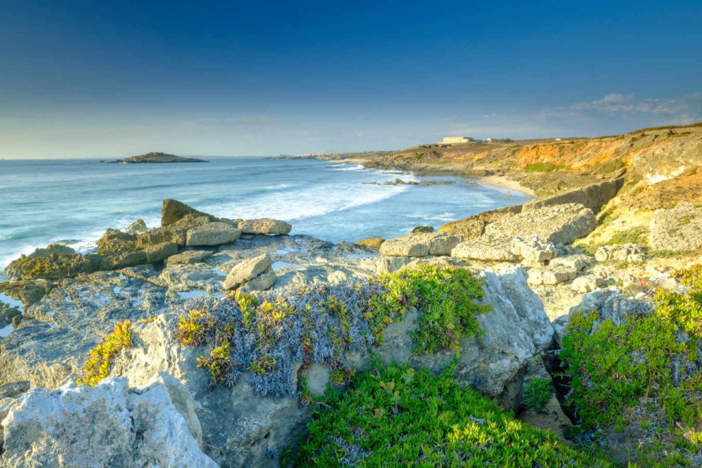 Sunset near Illha do Pessequiro (the 'Peachtree') along the Vincentine Coast National Park in the southwest of Alentejo region, Portugal