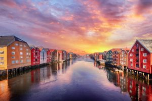 Colorful houses over water in Trondheim city - Norway